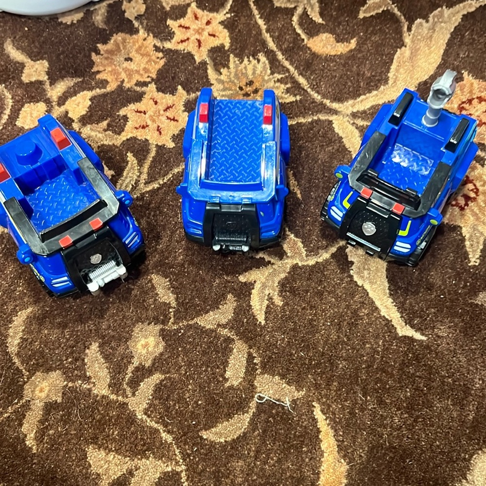 Three vehicles chase paw patrol